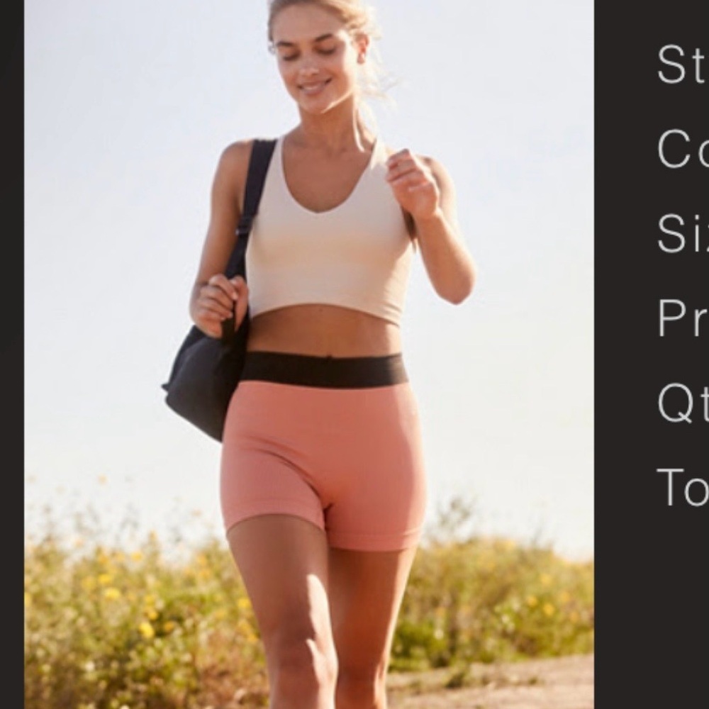 FP Movement by Free People Ribbed Athletic Shorts in Peach and Black